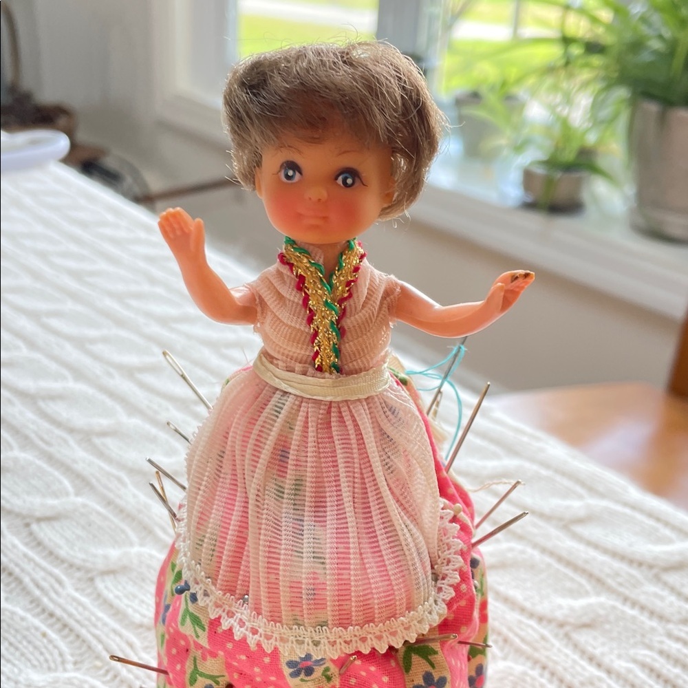 Vintage Doll Pin Cushion with Pink Floral Skirt and apron  1960s sewing needles